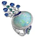 Chaumet Ring in white gold set with a18.13 carat cabochon-cut white opal, diamanti, blue tourmaline and tanzanites