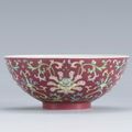 A ruby-ground Famille-Rose floral bowl, Caixiu Tang Mark, Qing Dynasty, 18th century