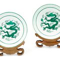 A pair of green-enamelled ‘dragon’ dishes, seal marks and period of Qianlong (1736-1795)