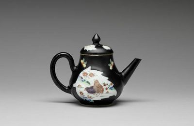 A black-ground polychrome-enamelled teapot and cover, Yongzheng-Qianlong period (1723-1795)
