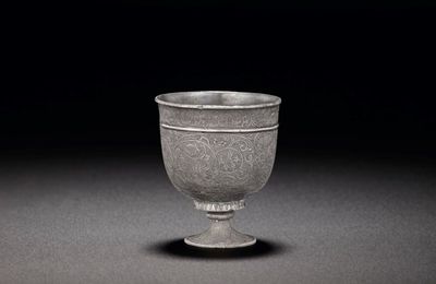 A small finely eengraved silver stem cup, Tang dynasty