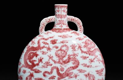 An exceptionally rare and finely painted copper-red 'nine dragon' moon flask, Seal mark and period of Qianlong