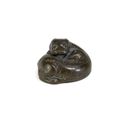 A silver-inlaid bronze 'tiger' weight, Han dynasty (206 BC-220 AD)