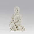A small Dehua figure of Damo, 17th-18th century