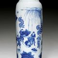 A blue and white cylindrical vase with figural scenes. China, 17th century