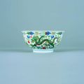 A Chinese Imperial porcelain wucai dragon and phoenix bowl. Six character sealmark of Jiaqing and of the period, 1796-1820.