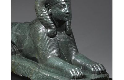 A Green Porphyry Sphinx of an Egyptian Queen, Roman Imperial, circa 1st Century A.D, probably reign of Domitian, A.D. 81-96. 