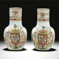 A rare pair of Imari armorial bottles and covers for the Portuguese market, Qing dynasty, Kangxi, circa 1720