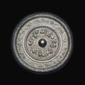 A large silvery bronze circular mirror, Sui dynasty (581-618)