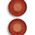 A fine and rare pair of inscribed coral-red glazed simulation lacquer chrysanthemum dishes, Gilt marks and period of Jiaqing