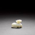 A small calcified jade deer pendant - Song/Yuan Dynasty
