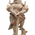 A painted pottery figure of a guardian, Tang dynasty