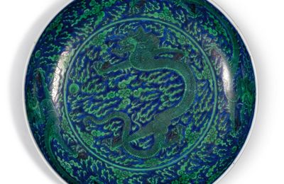 A blue-ground green-enameled ‘dragon’ dish, Mark and period of Kangxi