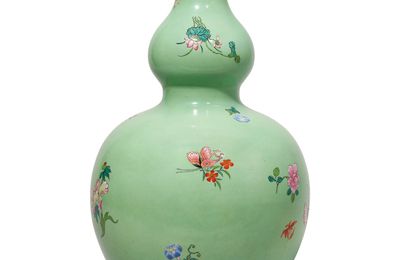 A large famille rose lime-green ground double-gourd vase, Qianlong six-character seal mark in iron red and of the period (1736-1