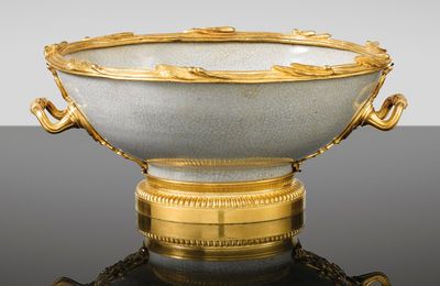 A gilt-bronze mounted Chinese celadon porcelain bowl, the mounts in Régence style, 19th century, signed Henry Dasson