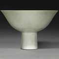 An incised white-glazed ‘lotus’ stemcup, Qianlong mark and period (1736-1795)