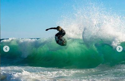 Italo Ferreira skimming with Brad Domke