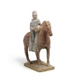 A grey painted pottery horse and rider, Northern Wei period (386-534)