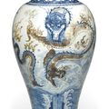 An underglaze-blue and copper-red 'dragon' vase,  Qing dynasty, Kangxi period (1662-1722)