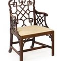A Rare Pair of George III Carved Mahogany 'Chinese' Arm Chairs, circa 1765