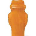 A very rare yellow amber flattened baluster vase and cover, 18th-19th century