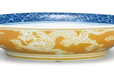 A café-au-lait glazed and blue and white 'dragon' dish, Mark and period of Kangxi (1622-1722)