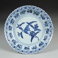 Dish, Blue-and-white with design of a bird eating a loquat, Ming dynasty, Yongle period (1403-1424)