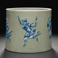 An underglaze blue and white-decorated celadon-ground brush pot, Kangxi period (1662-1722)