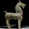 A large green-glazed red pottery figure of a horse, Eastern Han dynasty (AD 25-220)