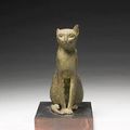 An Egyptian bronze cat. Late Period, circa 664-332 B.C.