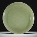 A large Longquan celadon carved dish, Ming dynasty, 15th century