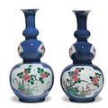 A pair of blue-ground famille verte triple-gourd vases & A pair of blue-ground kendis. Kangxi period @ Christie's New York