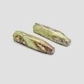 A pair of green, russet and calcified jade pigs, Han Dynasty (206 BC - 220 AD)