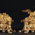 Paire de chenets à la salamandre et au phénix. D'après Charles Cressent. France, époque Régence, vers 1730