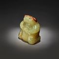 An exceptionally rare yellow and russet jade figure of a mythical toad, Six Dynasties (220-589)