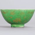 A very rare gilt and anhua-decorated green-enamelled ‘Deer and Phoenix’ bowl, Jiajing six-character mark and of the period 