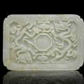 A pale green jade rectangular 'dragon' cup stand, Ming Dynasty