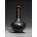 A small 'Rust'-Glazed Bottle Vase. Qing Dynasty, 18th / 19th Century