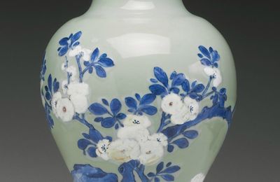 A celadon-ground, underglaze blue and copper red baluster vase, Qing dynasty, Kangxi period