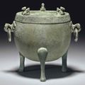 A small unusual bronze ritual tripod food vessel and cover, ding, Han dynasty (206 BC-AD 220)