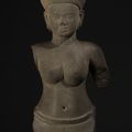 A sandstone bust of a female divinity, Cambodia, Angkor Period, style of Pre Rup, 10th century