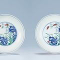 A fine and rare pair of doucai 'Narcissus' dishes , Yongzheng six-character marks within double circles and of the period 