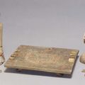Pair of Seated Figures Playing Liubo, Han dynasty 
