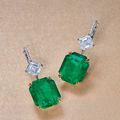 A Pair of 31.97 and 30.91 Carat Colombian Emerald and Diamond Ear Pendants