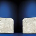 A magnificent pair of white jade 'boys' table screens, Qianlong period (1736-1795)