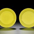 A fine pair of lemon-yellow saucer dishes, Marks and period of Yongzheng (1723-1735)