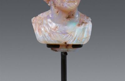A rare miniature carved opal bust of a Roman emperor, Presumably Italian, 17th century