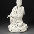 A Dehua figure of  seated Guanyin, early 17th century, He Chaozong impressed seal mark