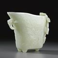 A fine white jade rhyton. Qing dynasty, 18th century. 