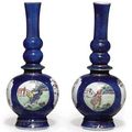 A pair of blue ground famille verte triple gourd vases. Kangxi period